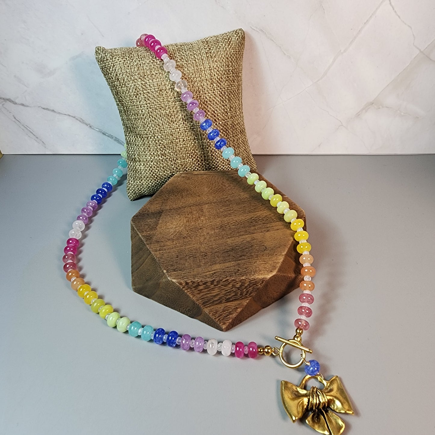 Multi Color Jade and Moonstone Necklace With Gold Bow Pendant
