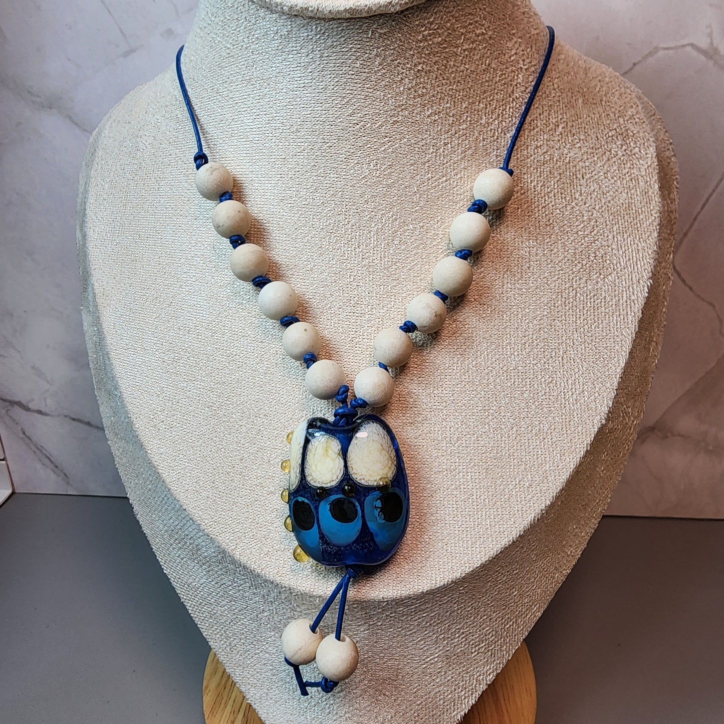 Organic Blue Lampwork Pendant And Fossil Coral Necklace
