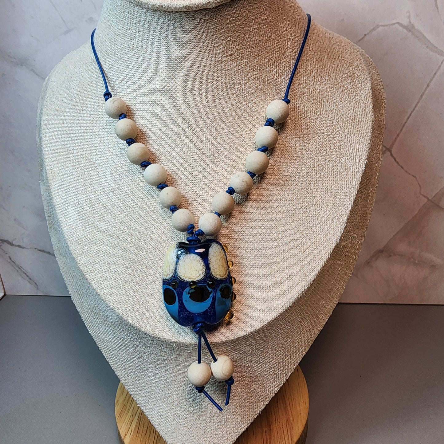 Organic Blue Lampwork Pendant And Fossil Coral Necklace