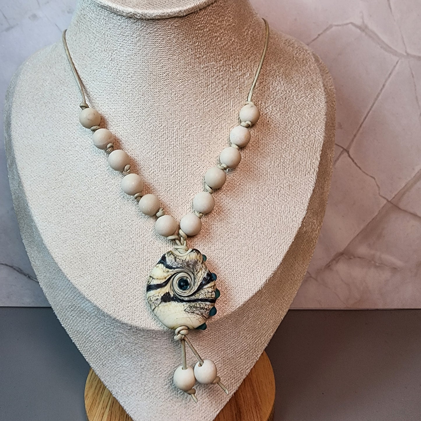 Organic Swirl Lampwork Pendant And Fossil Coral Necklace