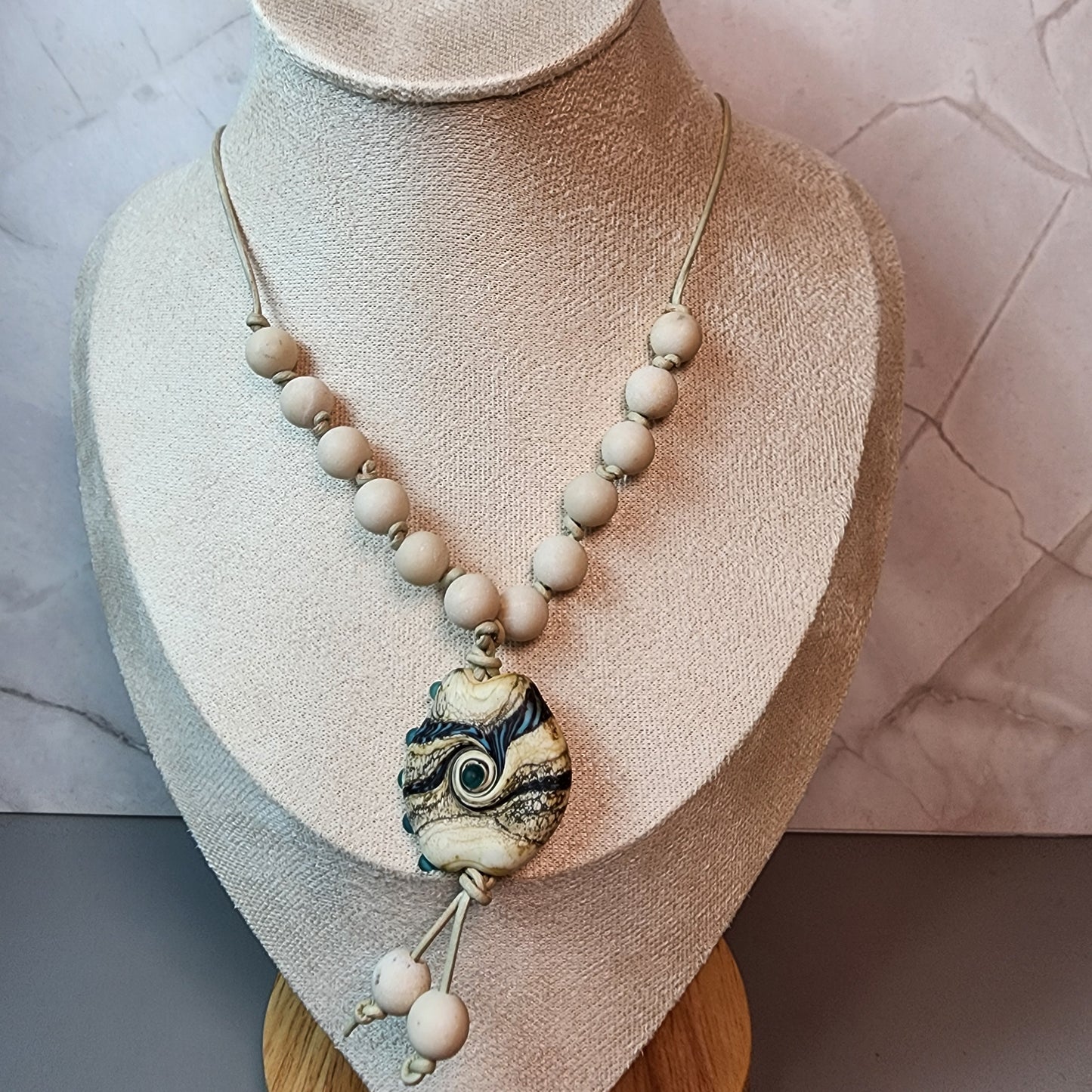 Organic Swirl Lampwork Pendant And Fossil Coral Necklace