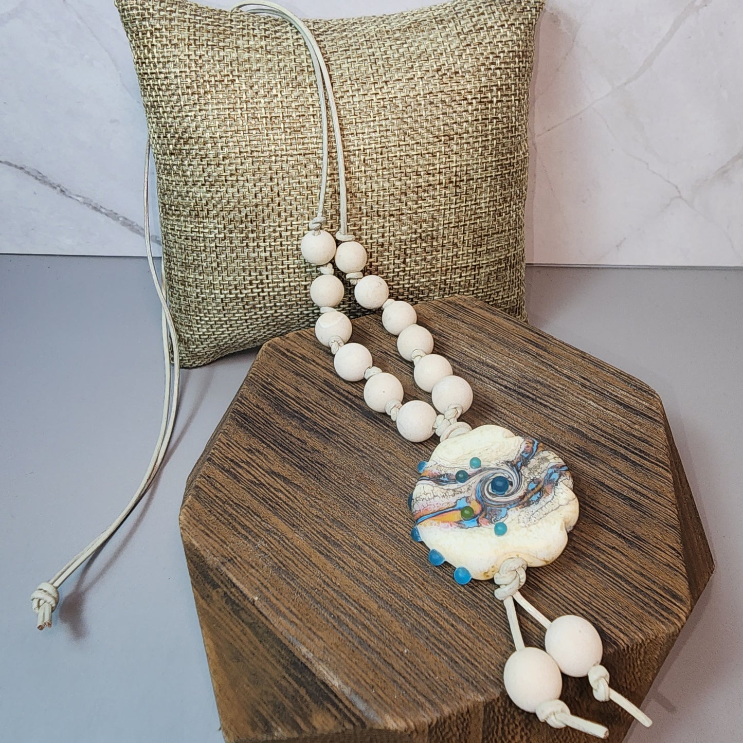 Organic Swirl Lampwork Pendant And Fossil Coral Necklace